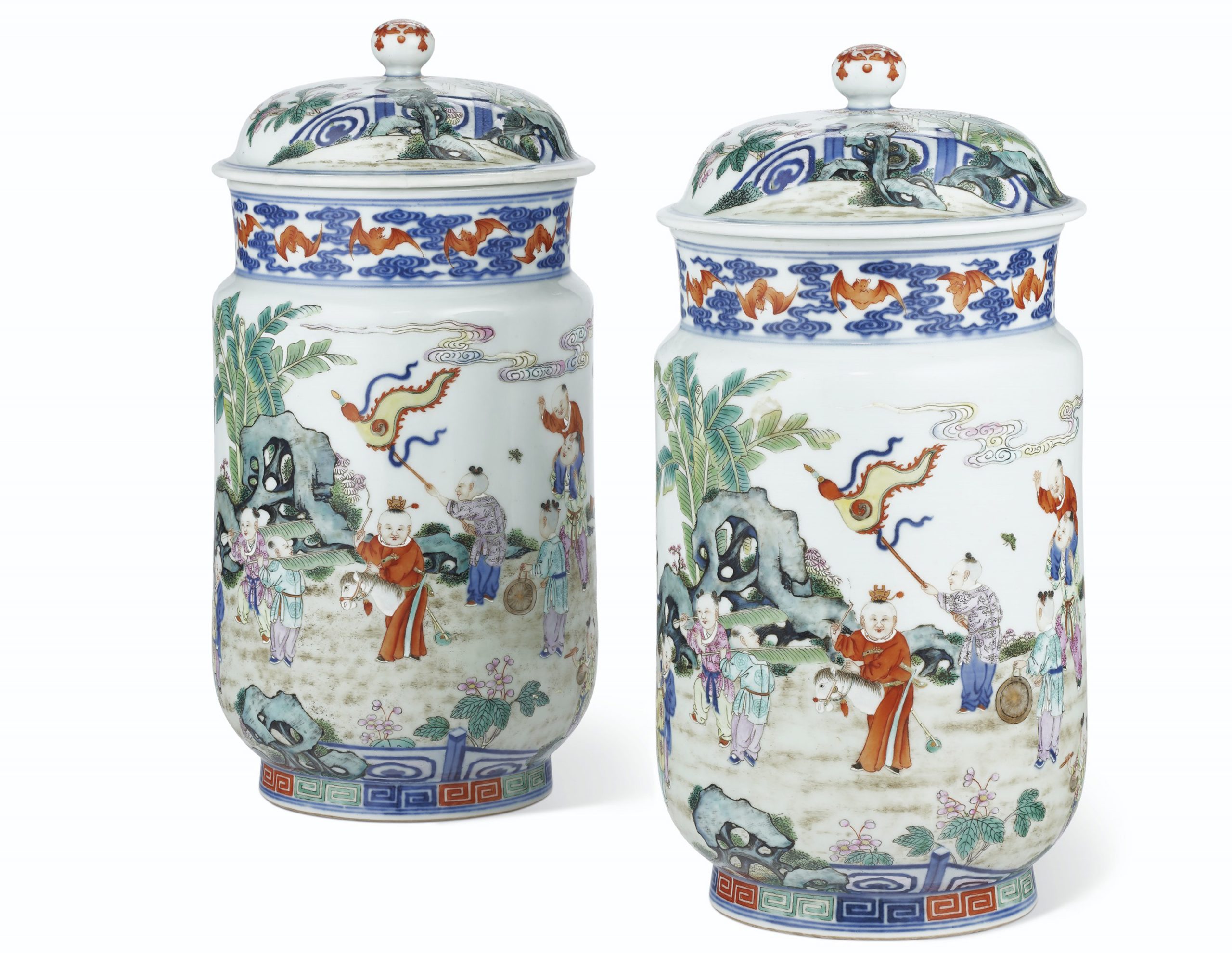 A VERY RARE PAIR OF FAMILLE ROSE 'BOYS' JARS AND COVERS