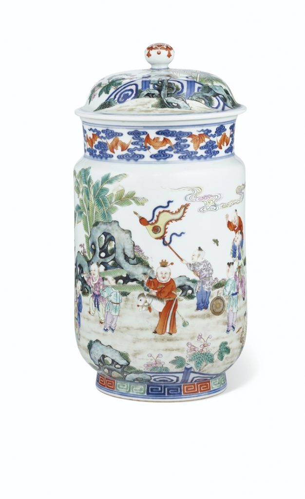 A VERY RARE PAIR OF FAMILLE ROSE 'BOYS' JARS AND COVERS