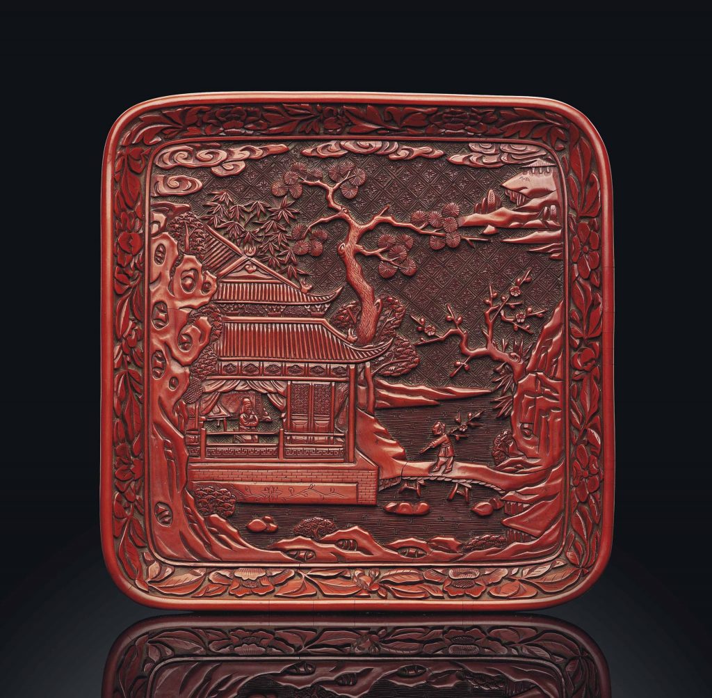 A CARVED CINNABAR LACQUER SQUARE DISH  