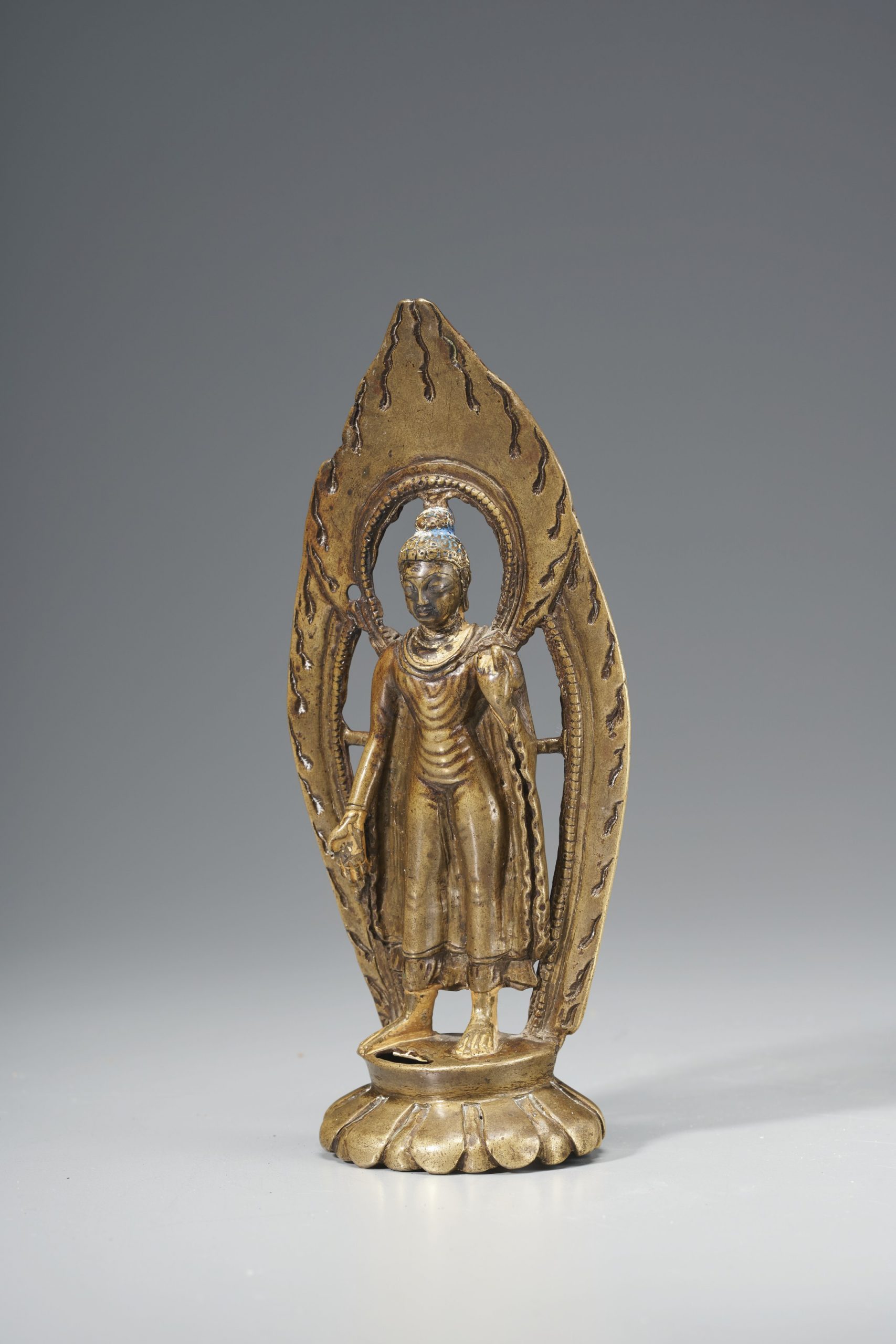 A SILVER- AND COPPER-INLAID BRONZE FIGURE OF BUDDHA SHAKYAMUNI PROPERTY FROM THE ESTATE OF BARONESS EVA BESSENYEY