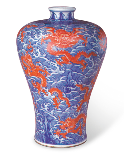 FIG. 1blue and white meiping in the collection of the Palace Museum, on which the nine dragons are painted in the arresting tone of iron-red over the glaze
