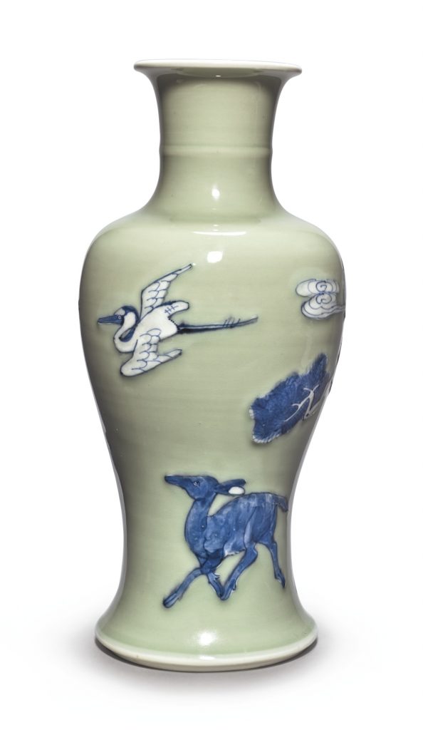 A CELADON-GROUND BLUE AND WHITE AND COPPER-RED 'LONGEVITY' VASE