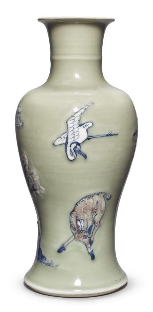 A CELADON-GROUND BLUE AND WHITE AND COPPER-RED 'LONGEVITY' VASE