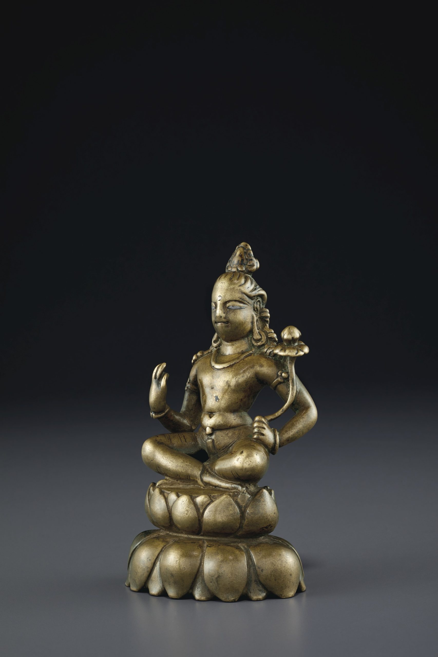 A COPPER- AND SILVER-INLAID BRONZE FIGURE OF PADMAPANI LOKESHVARA SWAT VALLEY, 8TH-9TH CENTURY 