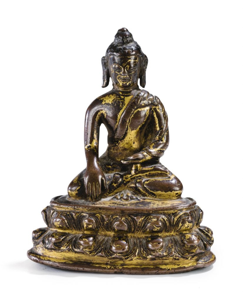 Small statuette of Buddha in gilded copper alloy Tibet XIV E century