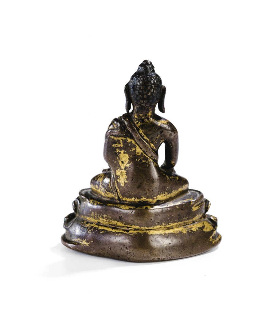 Small statuette of Buddha in gilded copper alloy Tibet XIV E century