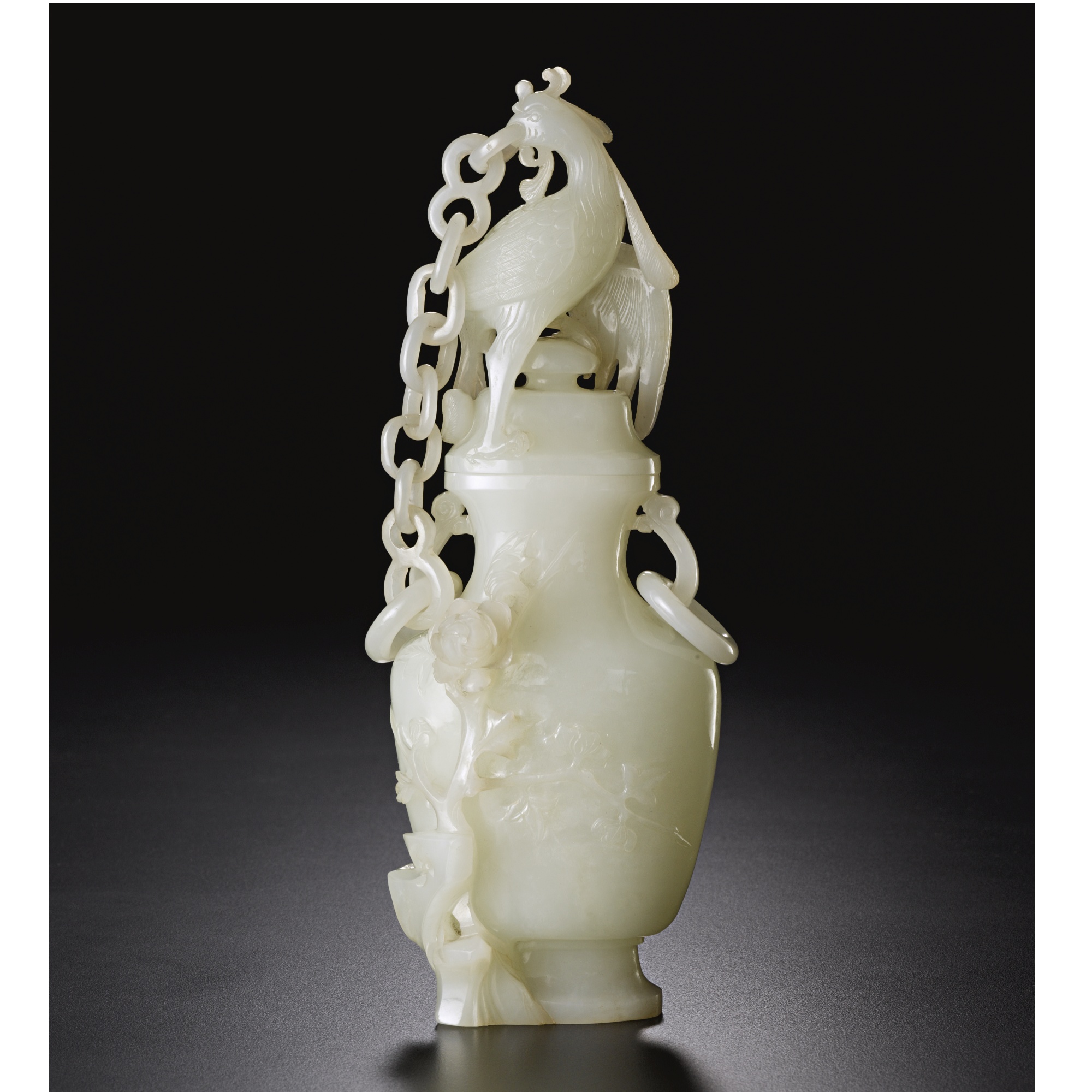 Sotheby's FINE CHINESE CERAMICS AND WORKS OF ART 632 PROPERTY FROM THE DESCENDANTS OF ROBERT E. AND KATHARINE CHEW TOD A WHITE JADE 'PHOENIX' VASE AND CHAINED COVER