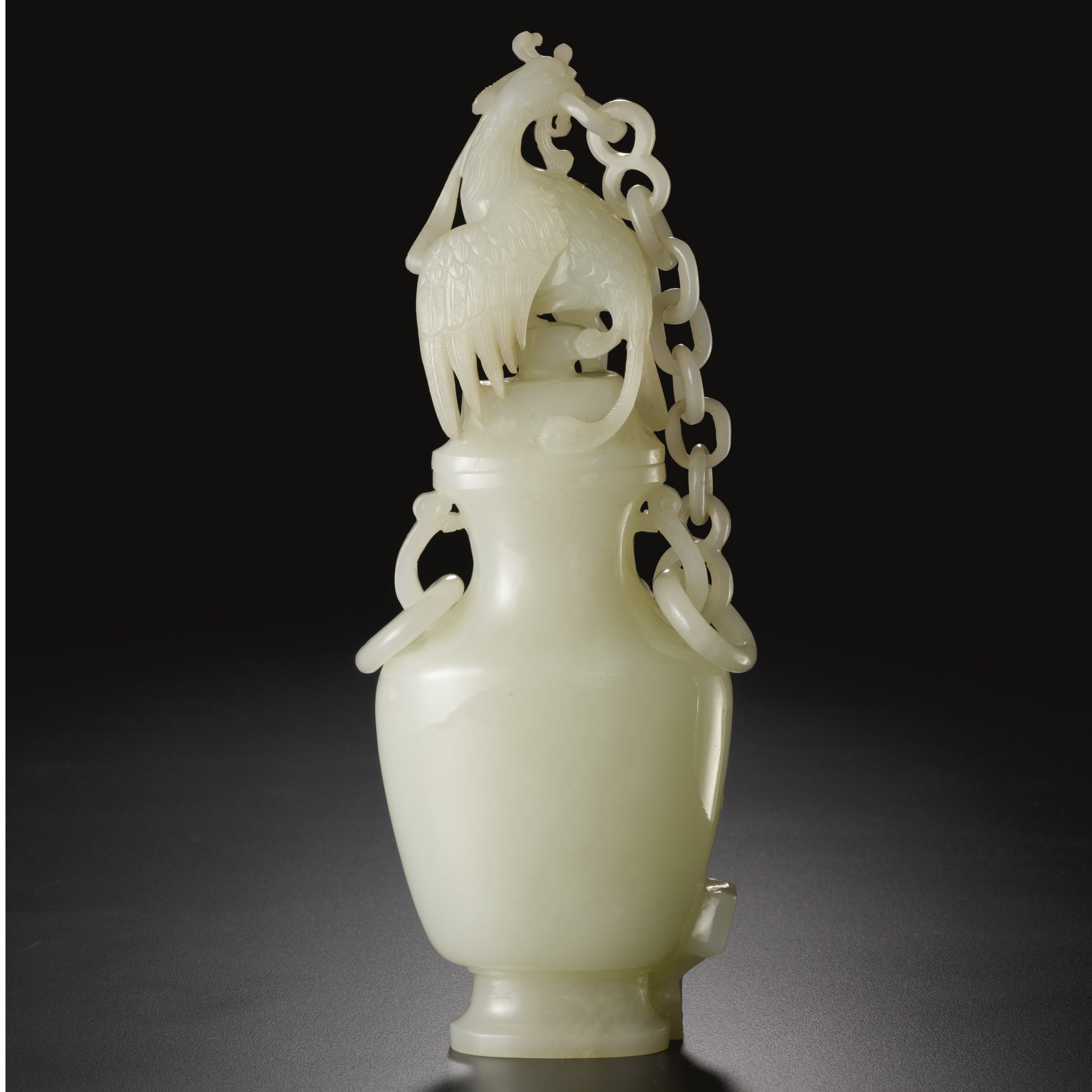 Sotheby's FINE CHINESE CERAMICS AND WORKS OF ART 632 PROPERTY FROM THE DESCENDANTS OF ROBERT E. AND KATHARINE CHEW TOD A WHITE JADE 'PHOENIX' VASE AND CHAINED COVER