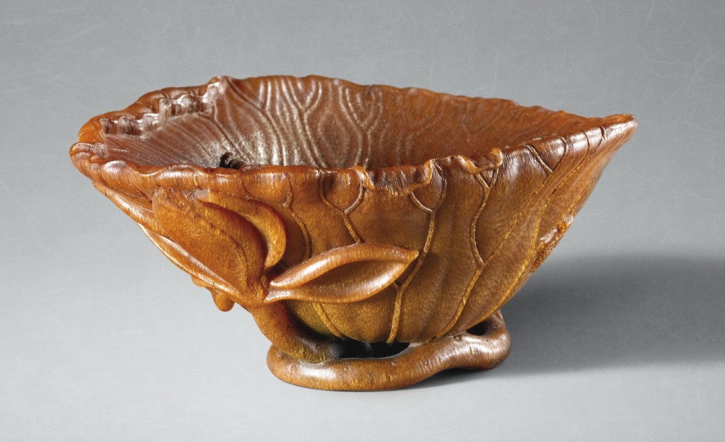 A RHINOCEROS HORN ‘LOTUS LEAF’ CUP SIGNED SHANG MING QING DYNASTY, 18TH CENTURY