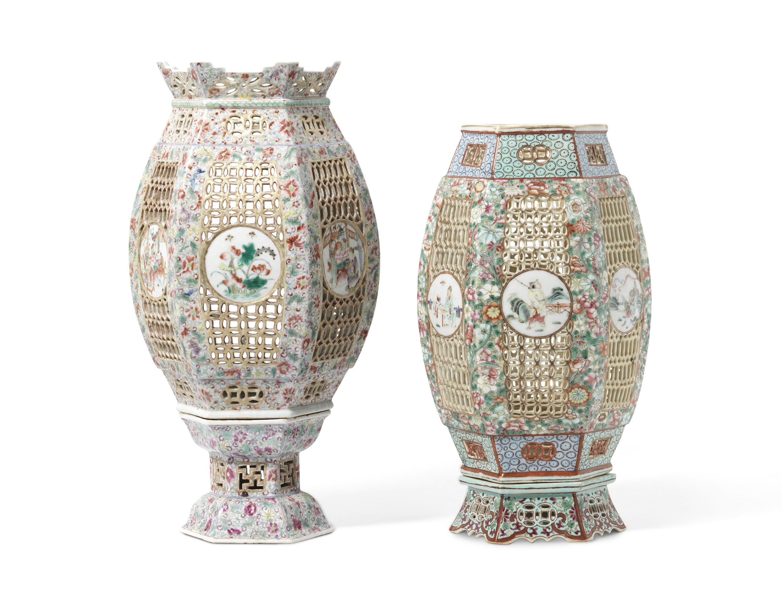 TWO FAMILLE ROSE RETICULATED LANTERNS AND STANDS