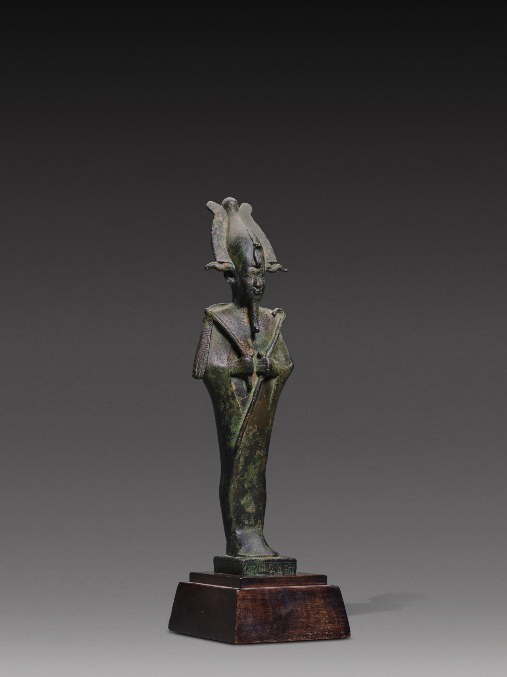 An Egyptian Bronze Figure of Osiris,