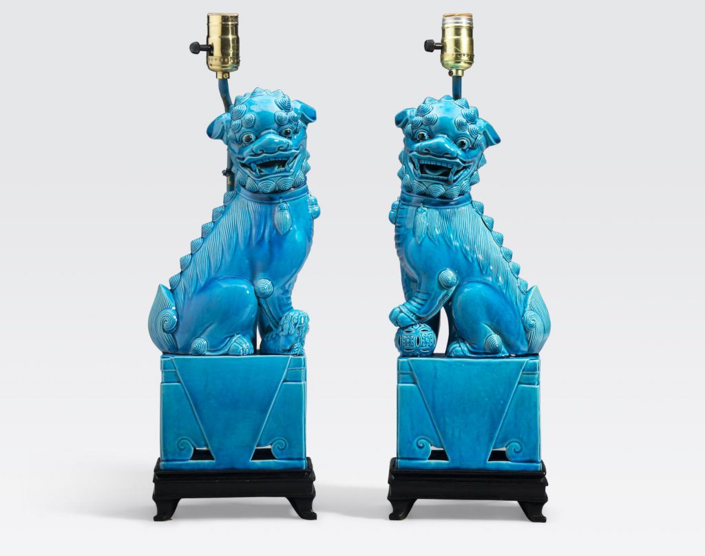 亚洲装饰艺术 拍卖信息 Lot 9378 A pair of turquoise glazed porcelain fu-lions First half of the 20th century