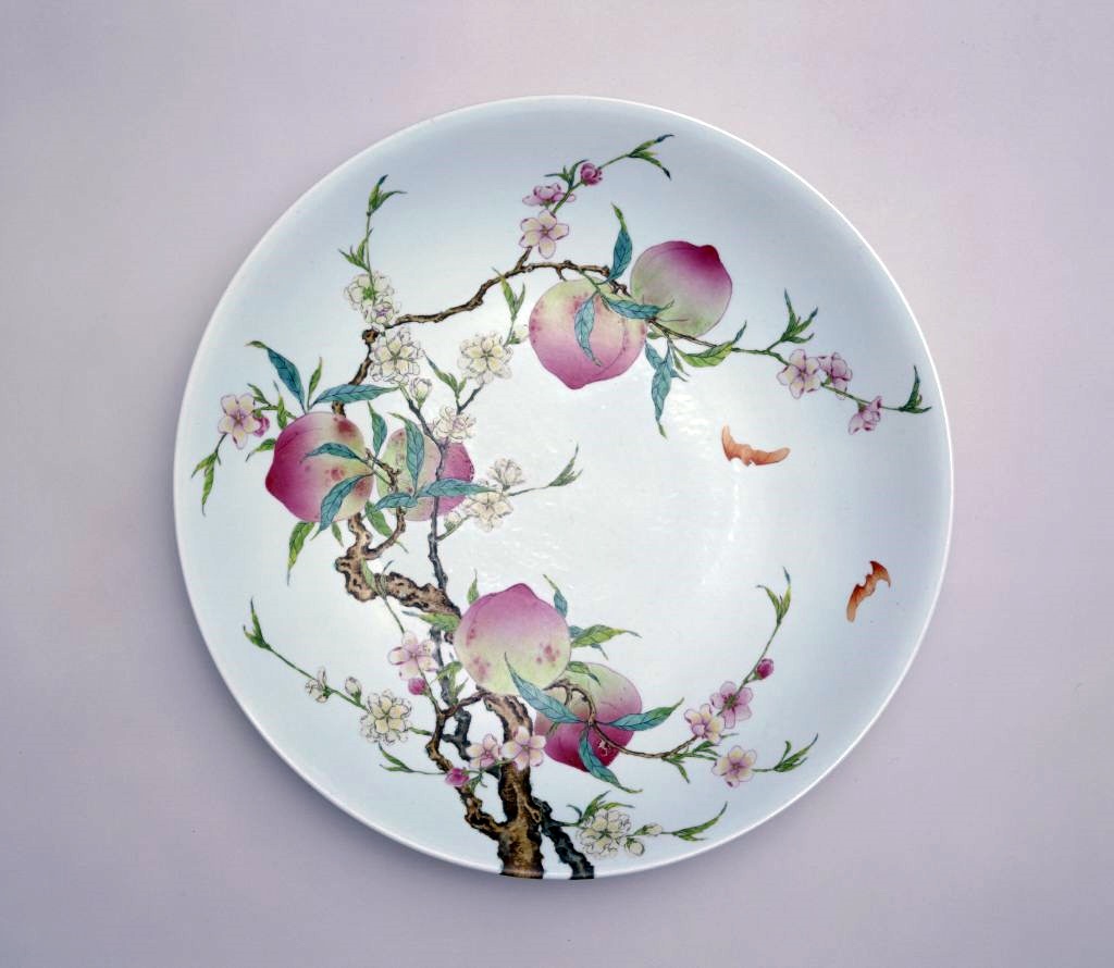 Famllie rose plate with peach tree, during the reign of Emperor Yongzheng of the Qing Dynasty, housed in the Palace Museum