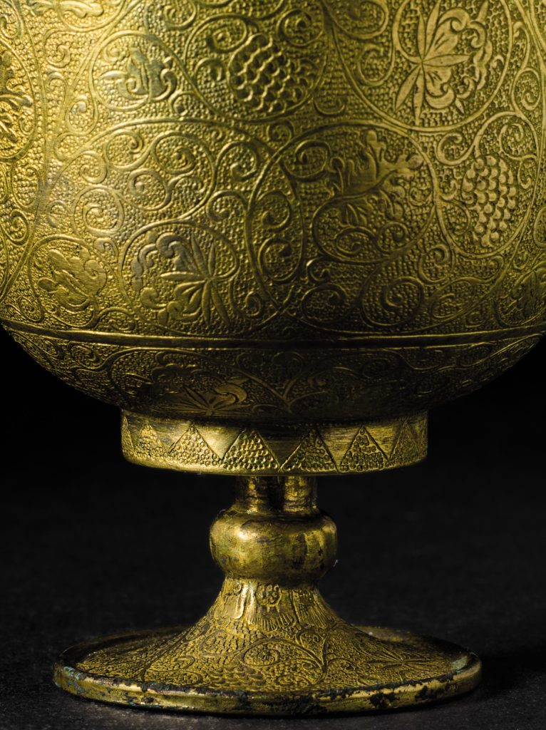 Lot 916 A SMALL FINELY-ENGRAVED GILT-BRONZE STEM CUP