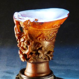 明 仿青铜器饕餮梅花如意纹 雕犀牛角爵杯