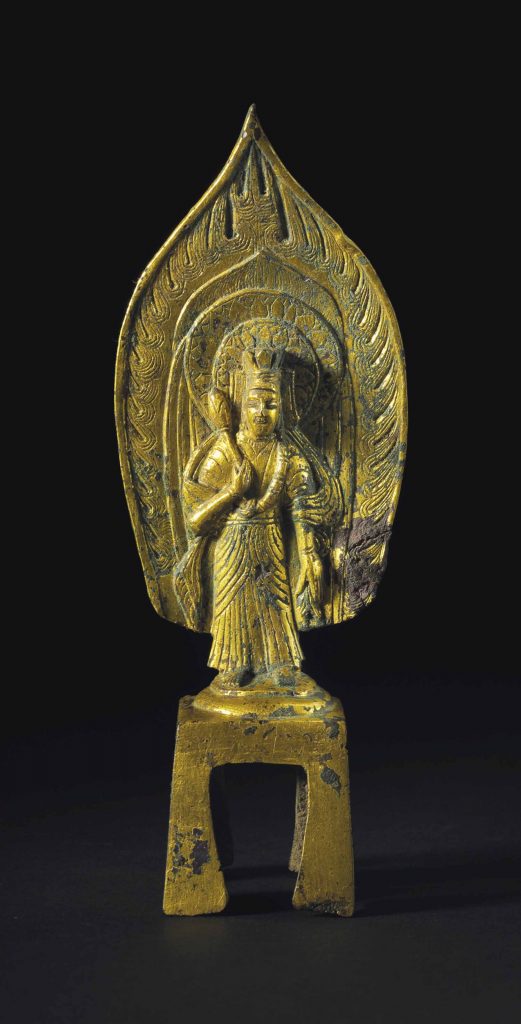 北魏正光五年（公元524年） 鎏金铜观世音立像，高7吋 (17.8 公分)。估价：60,000-80,000美元 成交价 USD 275,000。佳士得纽约于2017年9月14日举行的观悟正道：日本珍藏早期佛教艺术拍卖中呈献此拍品。