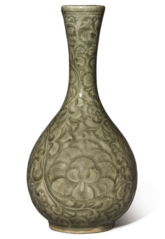Lot 214. A rare carved 'Yaozhou' celadon-glazed 'Peony' vase, Song dynasty (960-1279). Height 7 3/8  in., 18.7 cm. Estimate 40,000 —60,000 USD. Sold Price: 56,250 USD