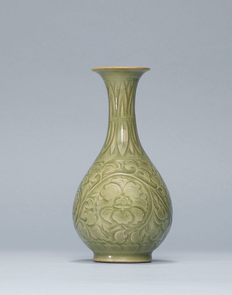 A rare carved Yaozhou pear-shaped vase, Northern Song dynasty (960-1127); 7 3/4 in. (17.7 cm.) high. Sold for 1,240,000 HKD t Christie's Hong Kong, 6th April 2015, lot 147. © Christie's Images Ltd 2015