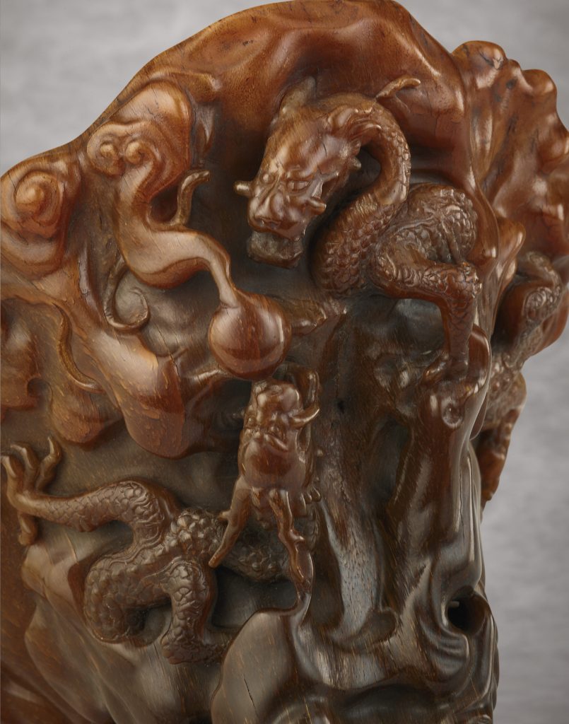 清十八世紀犀角雕雲龍戲珠紋盃